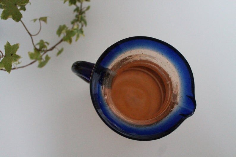 Bubble glass jug made by French craftsmen, blue and orange
