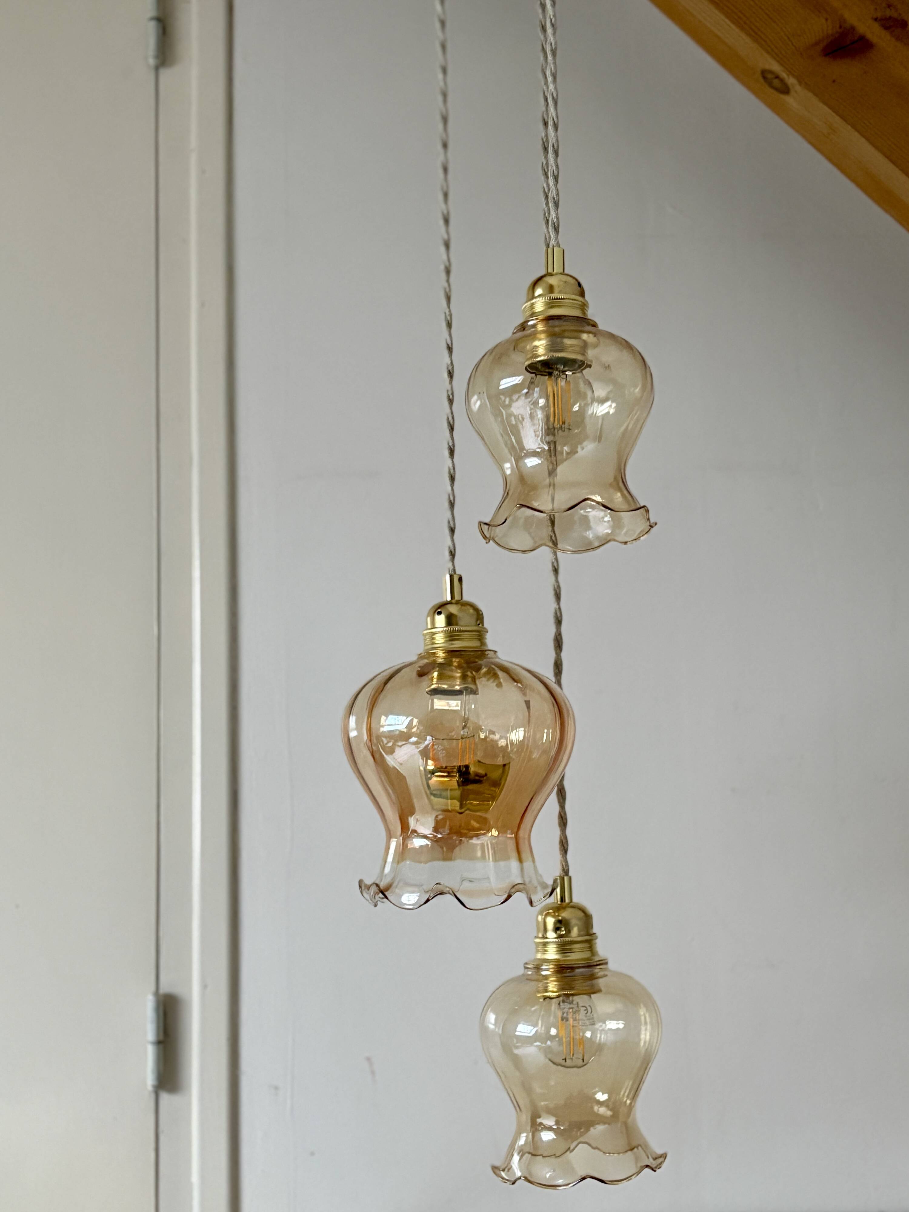 Triple vintage tulip pendant light in amber glass