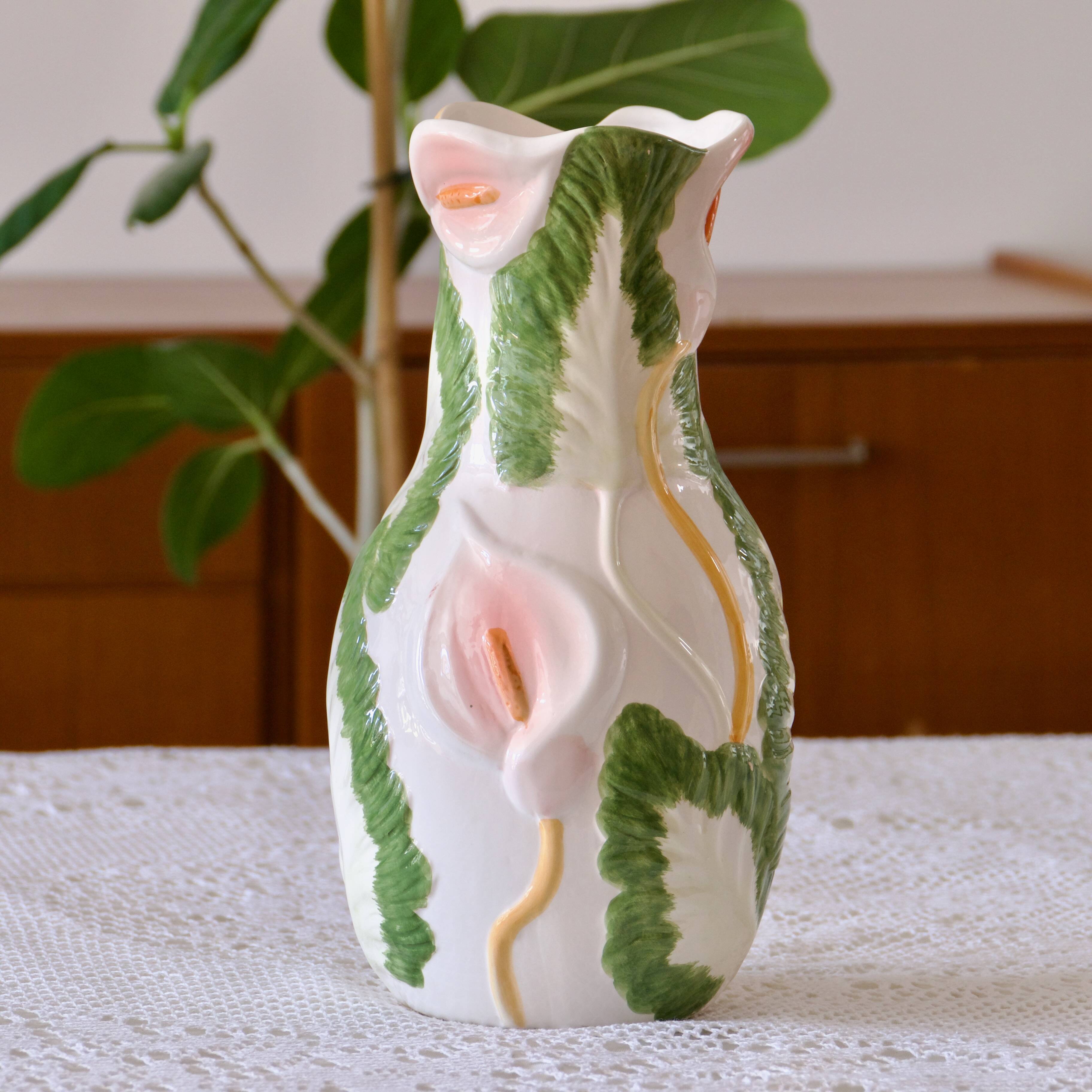 Large slip vase of Arum flowers