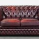 Original English Chesterfield sofa in red cowhide 2 seater