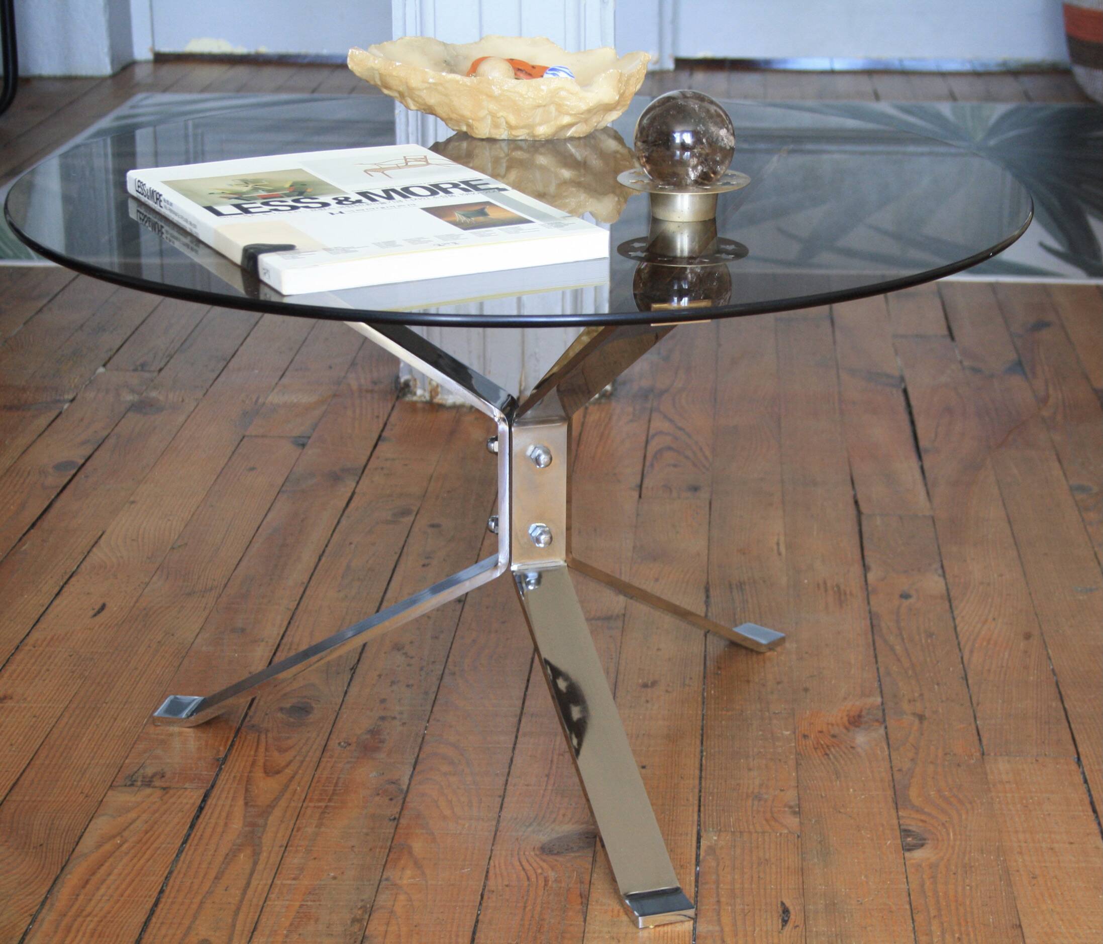 Round coffee table in smoked glass and chrome