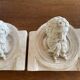Two moulds; plaster heads