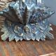 Antique bronze holy water font