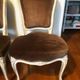 A pair of Louis XV style armchairs in wood and velvet fabrics