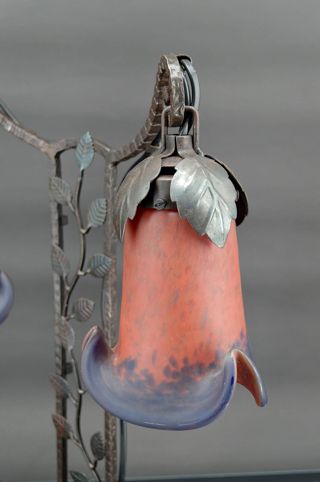 Two-headed wrought iron lamp by Muller, Art Deco, France, Circa 1920