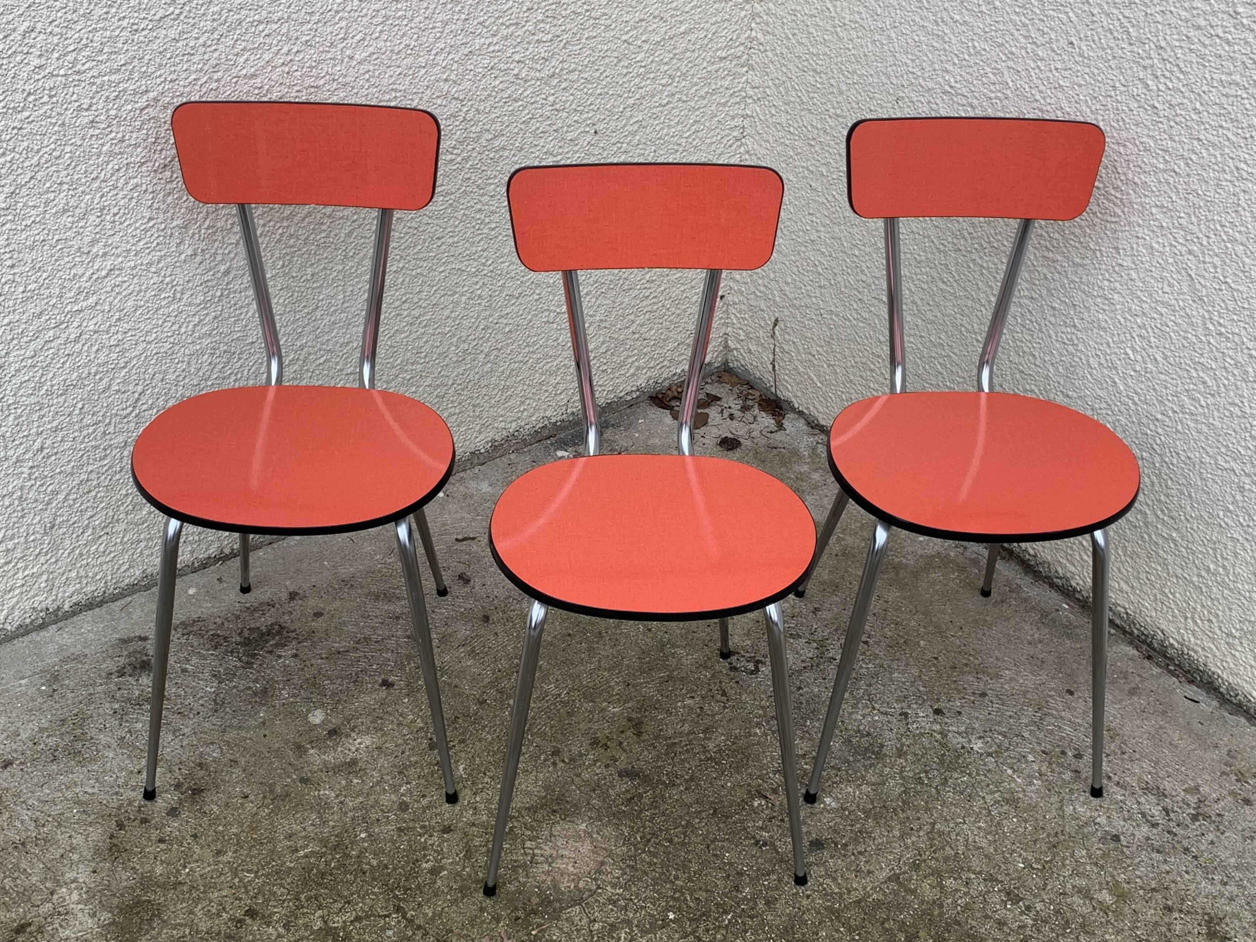 Red formica chairs 1950