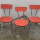 Red formica chairs 1950