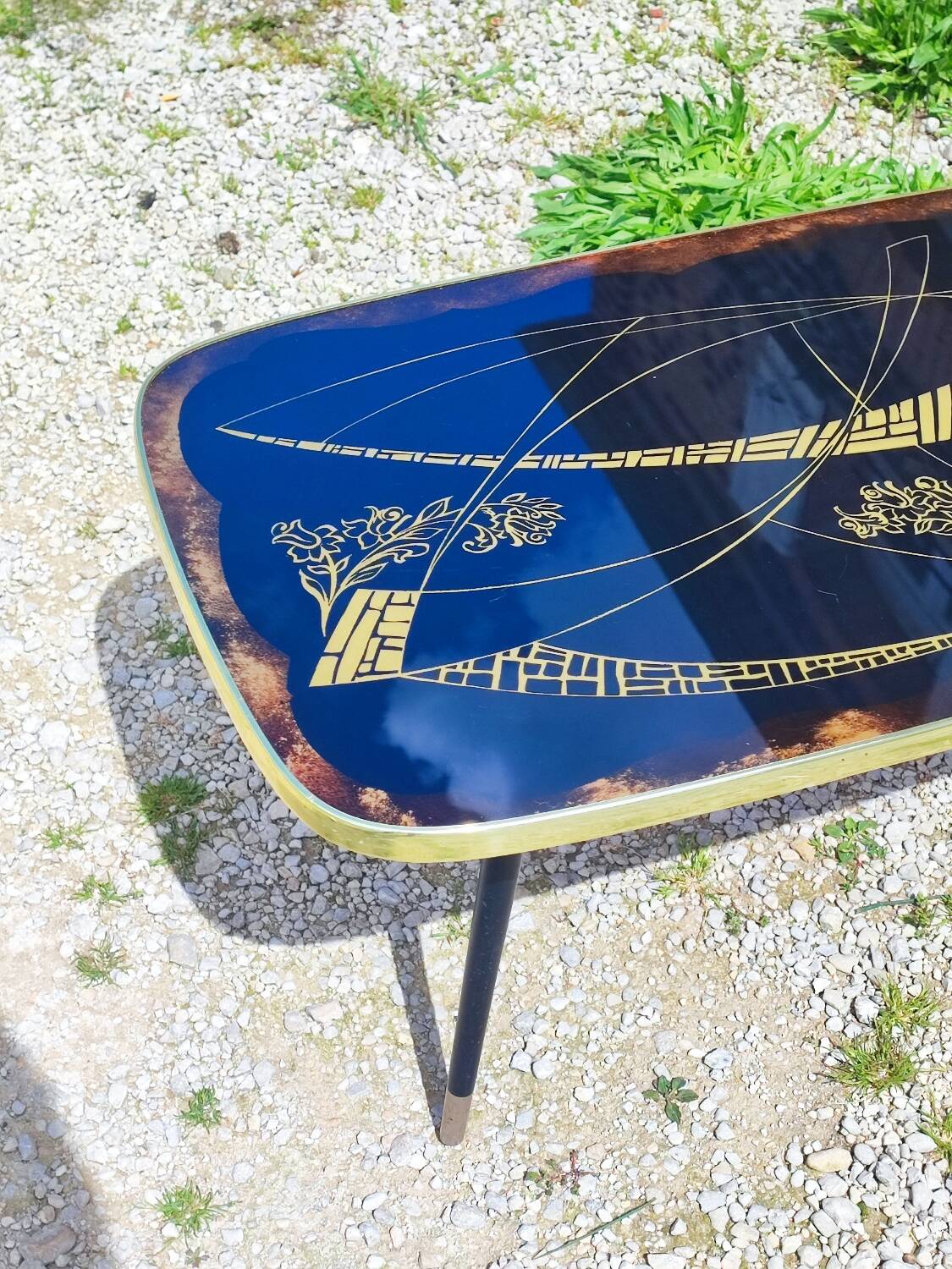 Vintage coffee table with compass legs