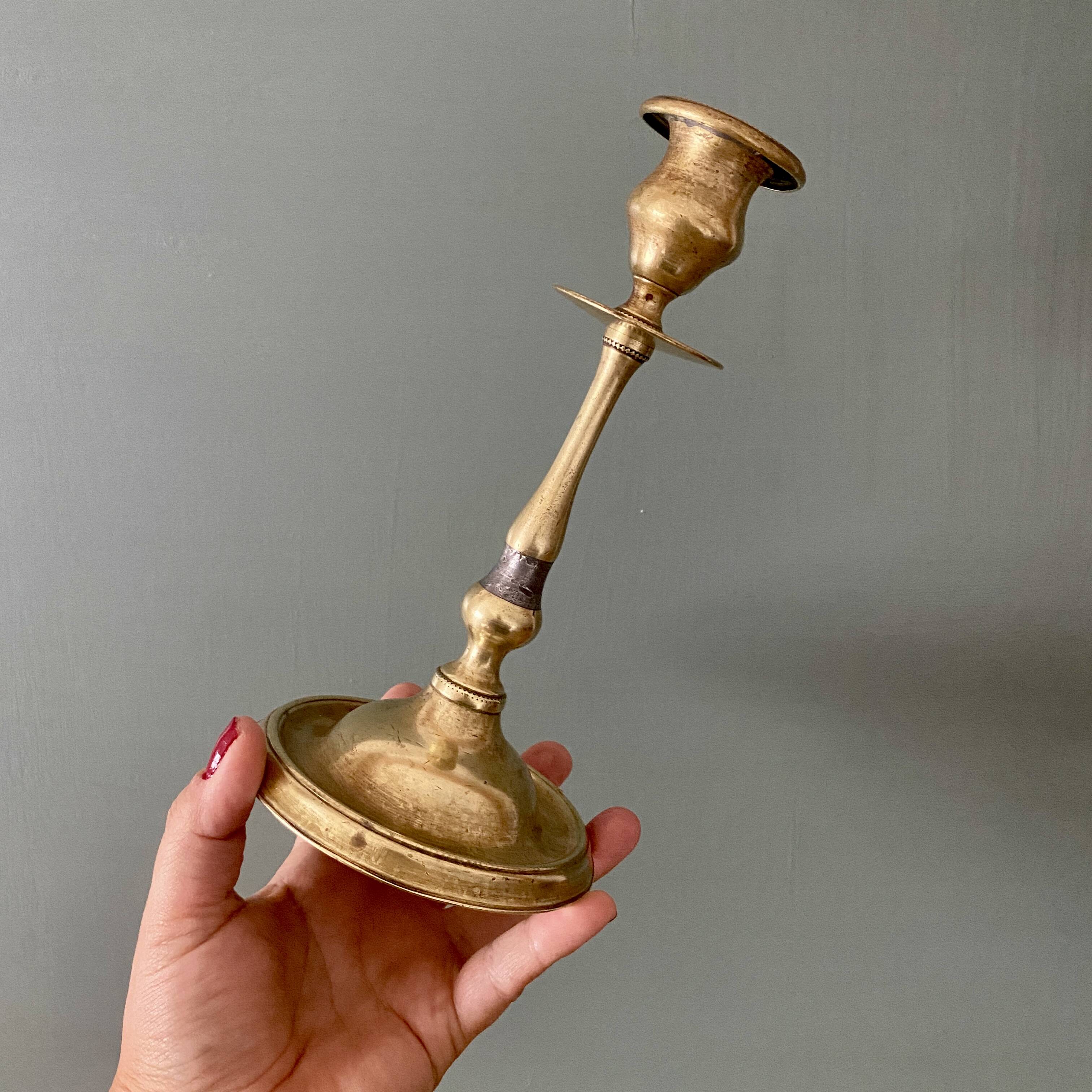 Antique brass candlestick holder