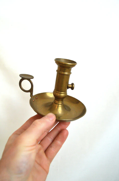 Brass cellar candle holder