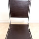 Ensemble de 2 chaises pliantes anciennes en fer forgé et cuir