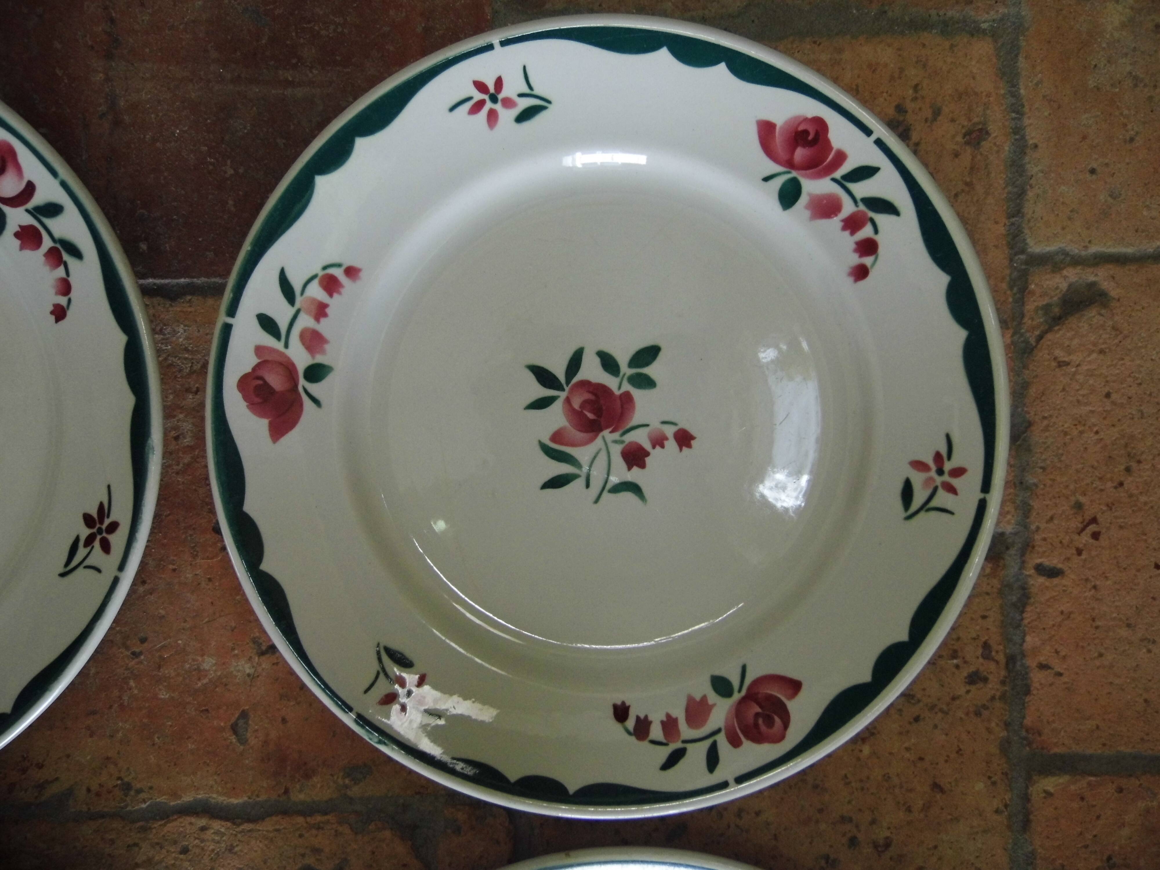 4 plates in faience of Badonviller F.B, floral motif, 20s