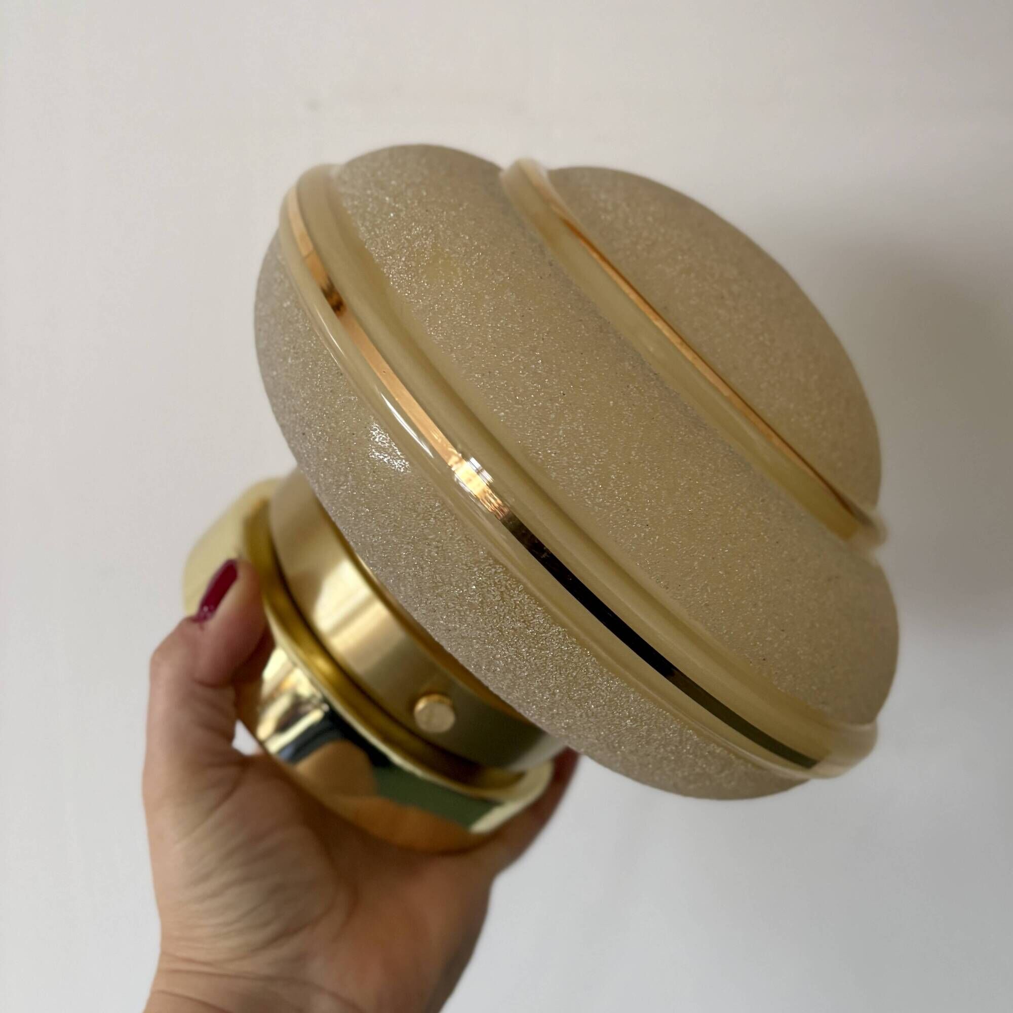 Vintage Art Deco globe wall/ceiling light in frosted yellow and gold glass.