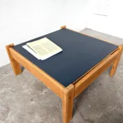 Modernist coffee table in solid pine with a reversible top, 1970s.
