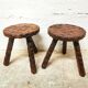 Carved wooden tripod stool