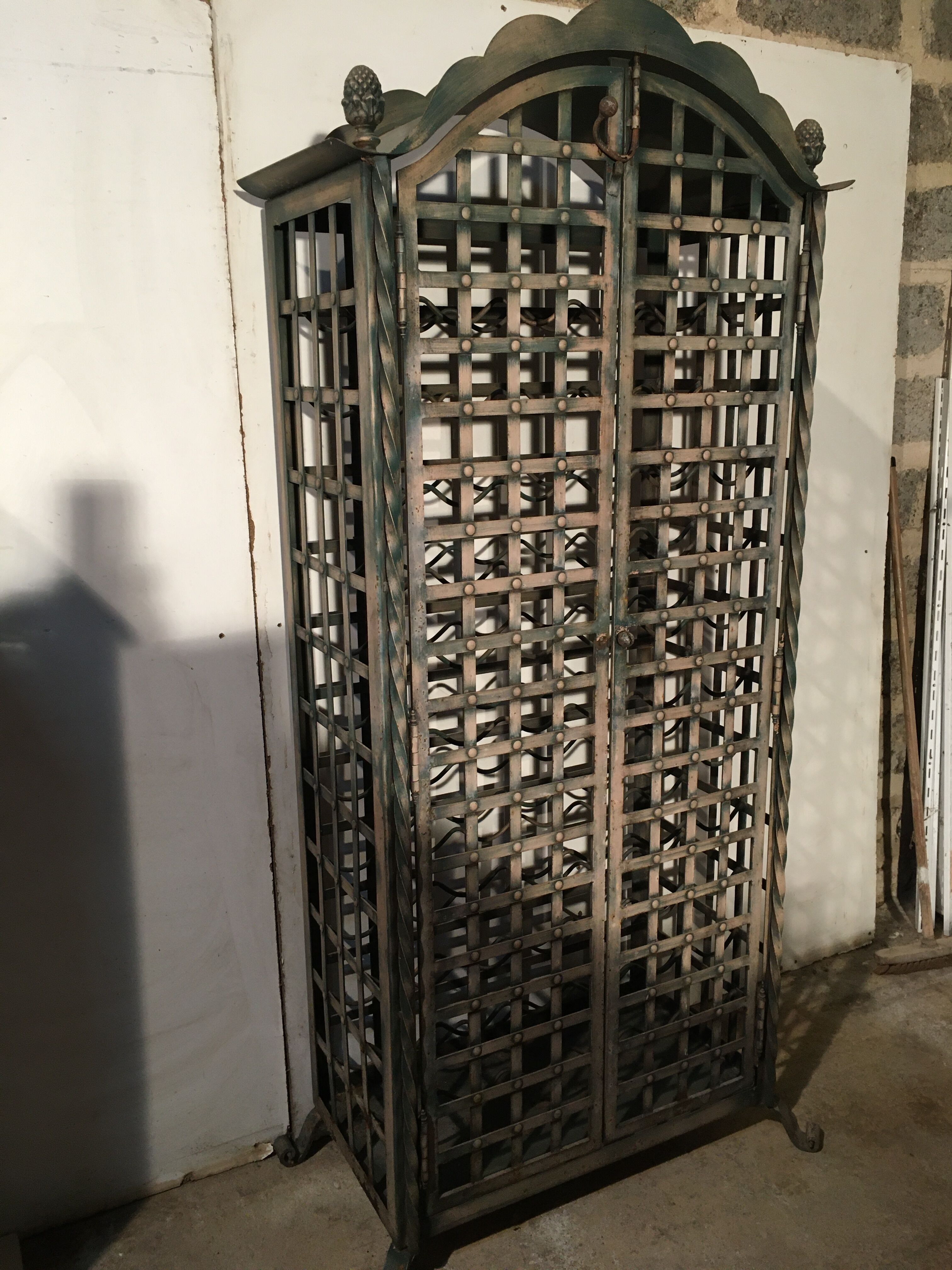 Wrought iron wine cabinet
