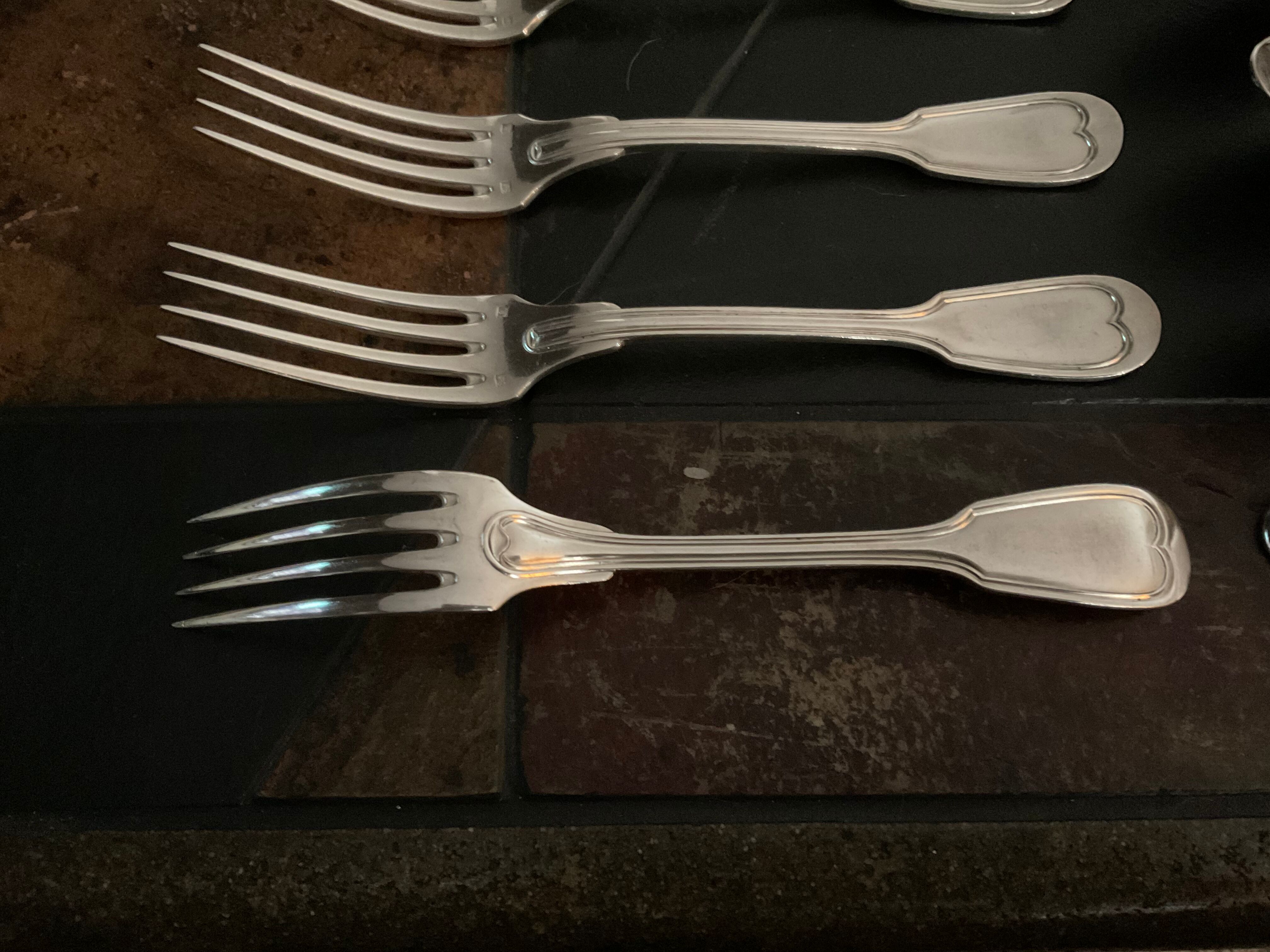 12 forks and 12 spoons.old .silver metal