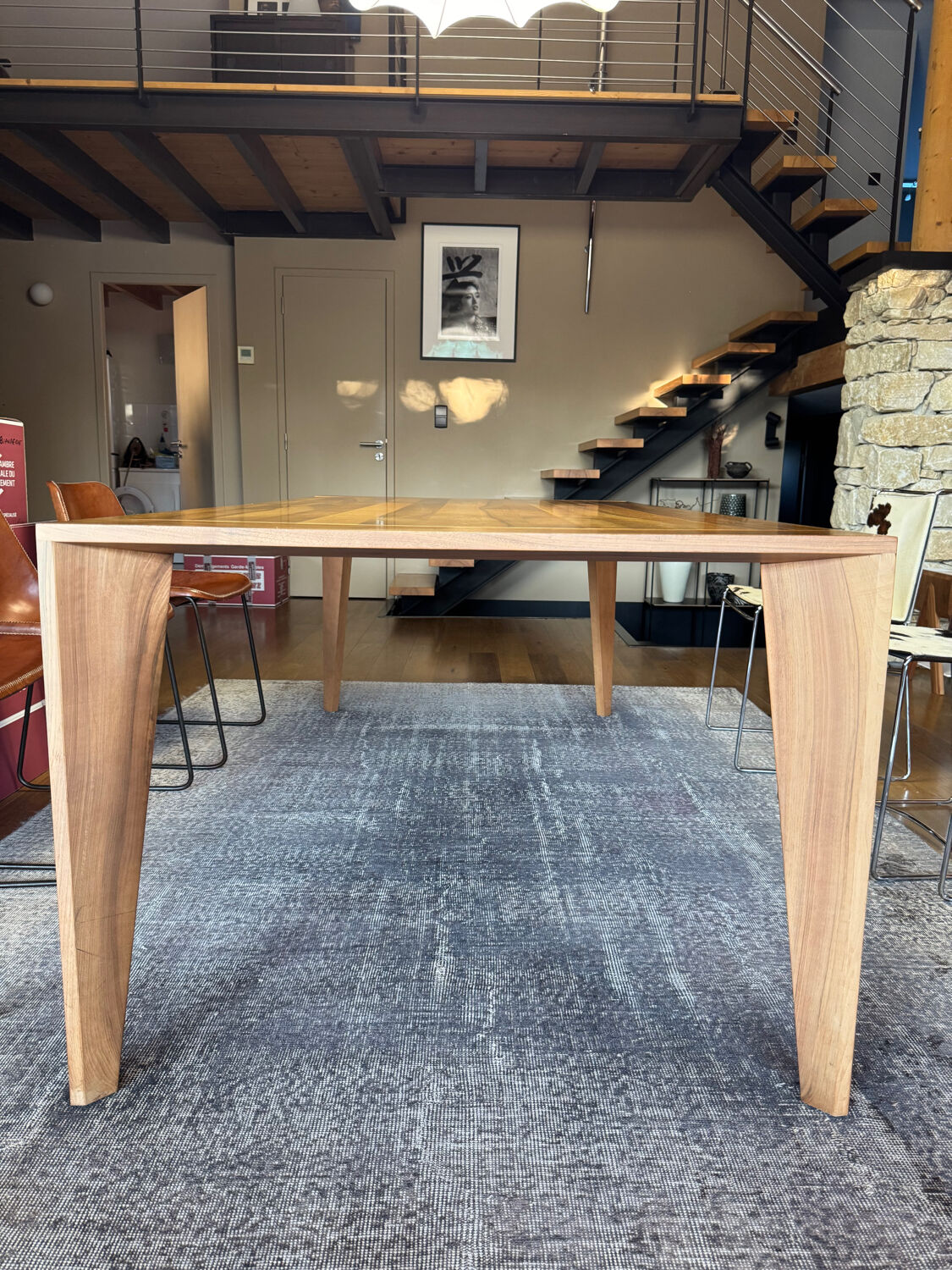 Dining table ligne roset model trapèze in solid walnut with oil finish.