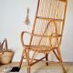 Fauteuil ancien en rotin large dossier