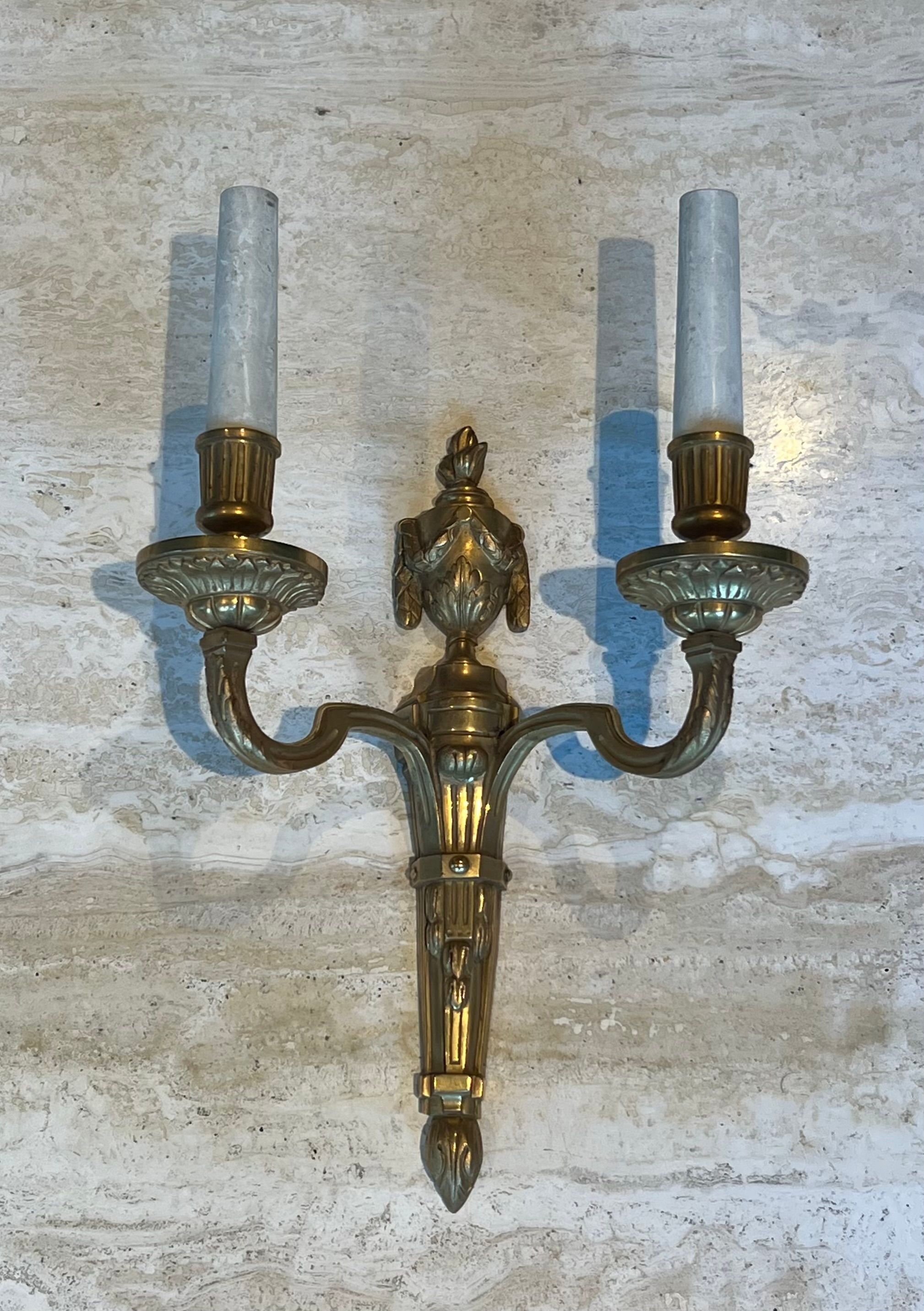 Set of 4 bronze wall lights in Louis XVI style.