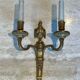Suite de 4 appliques en bronze de style Louis XVI