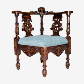 Neo-Renaissance corner armchair in carved walnut