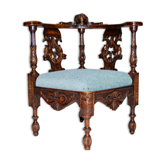 Neo-Renaissance corner armchair in carved walnut