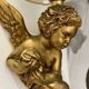 Pair of golden Puttis wall lights