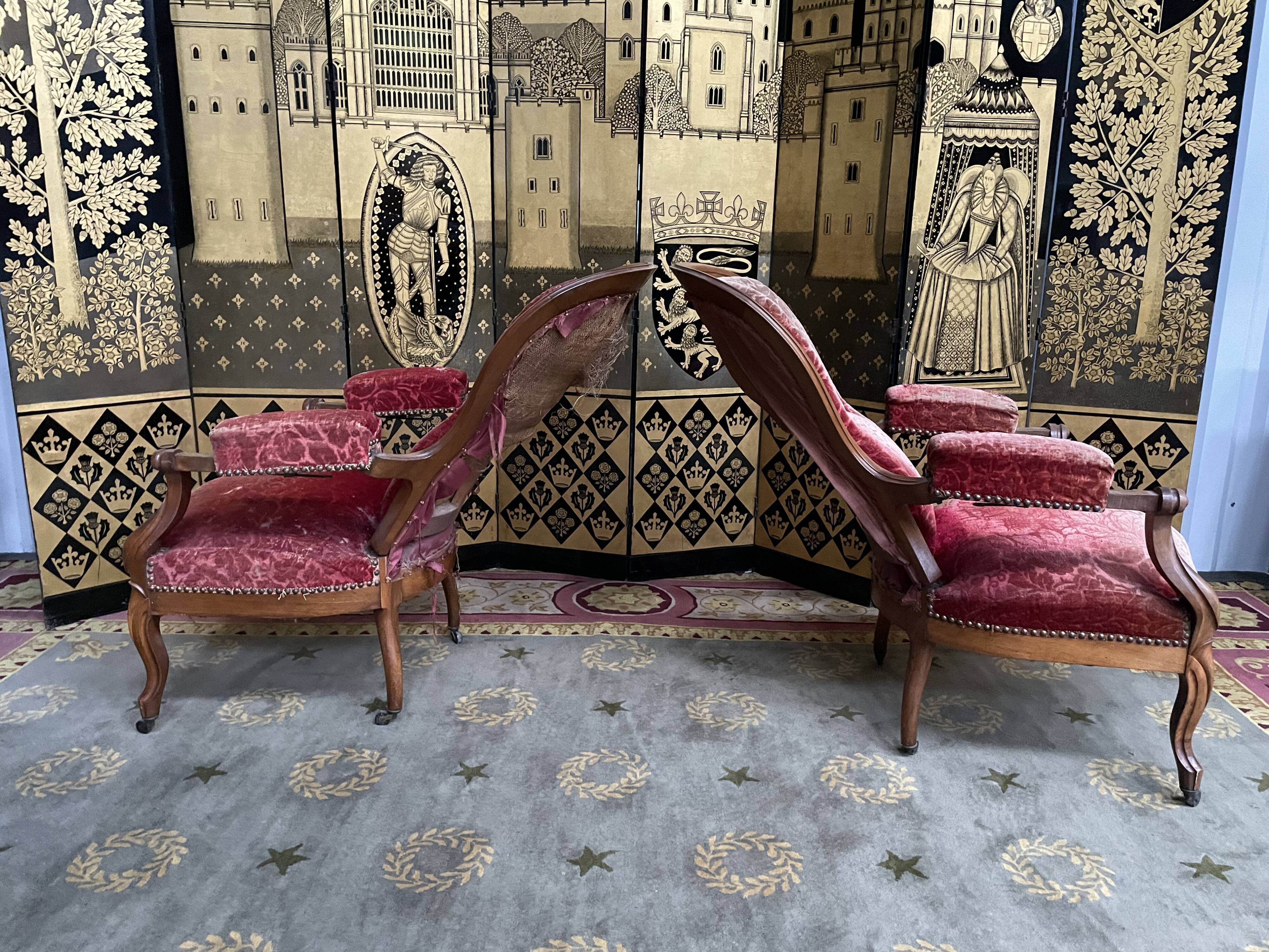 Pair of Louis Philippe period armchairs with rack and pinion