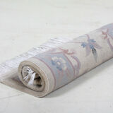 Chinese tassel rug with floral pattern on beige background 118x61cm