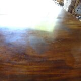 Nineteenth round table in carved mahogany with extension Ø 133 cm