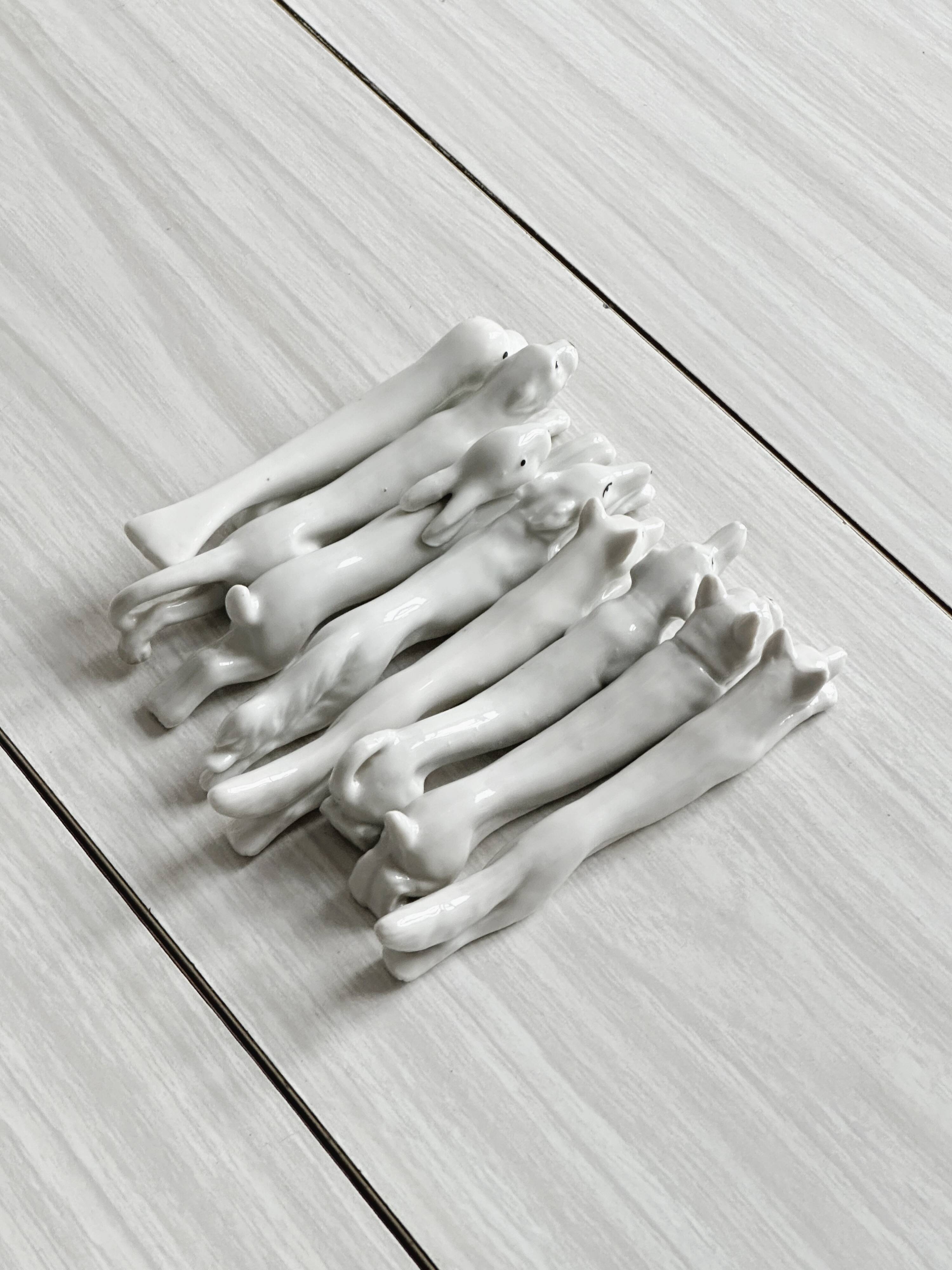 Porcelain animal knife holder.