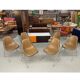 6 chaises empilables Eames de Herman Miller avec des coussins en naugahyde marron.