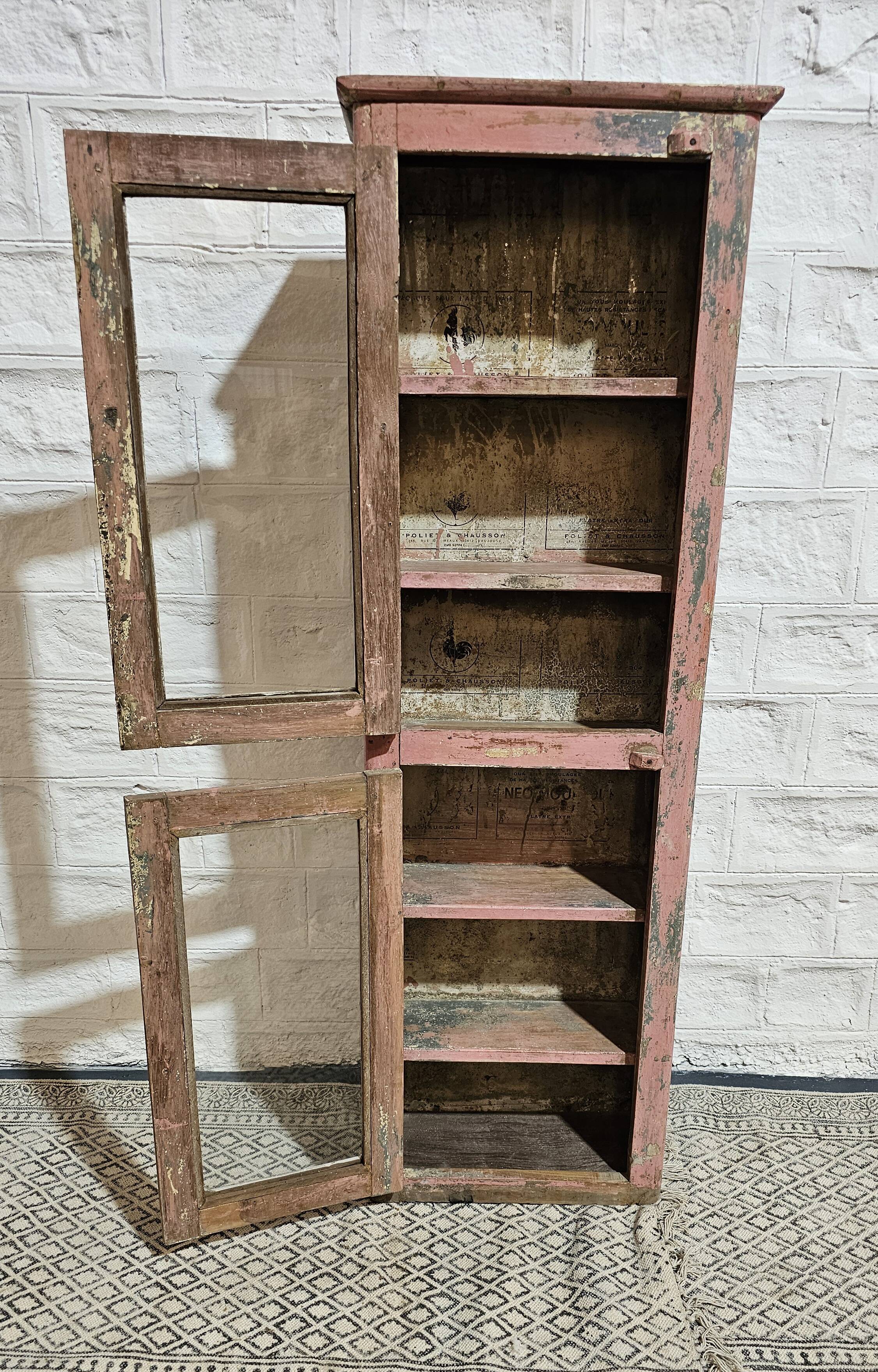 Pink showcase in Burmese teak