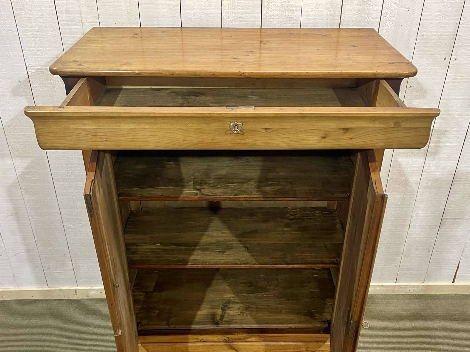 Small Louis Philippe 19th century cherry wood wardrobe with a drawer at the top