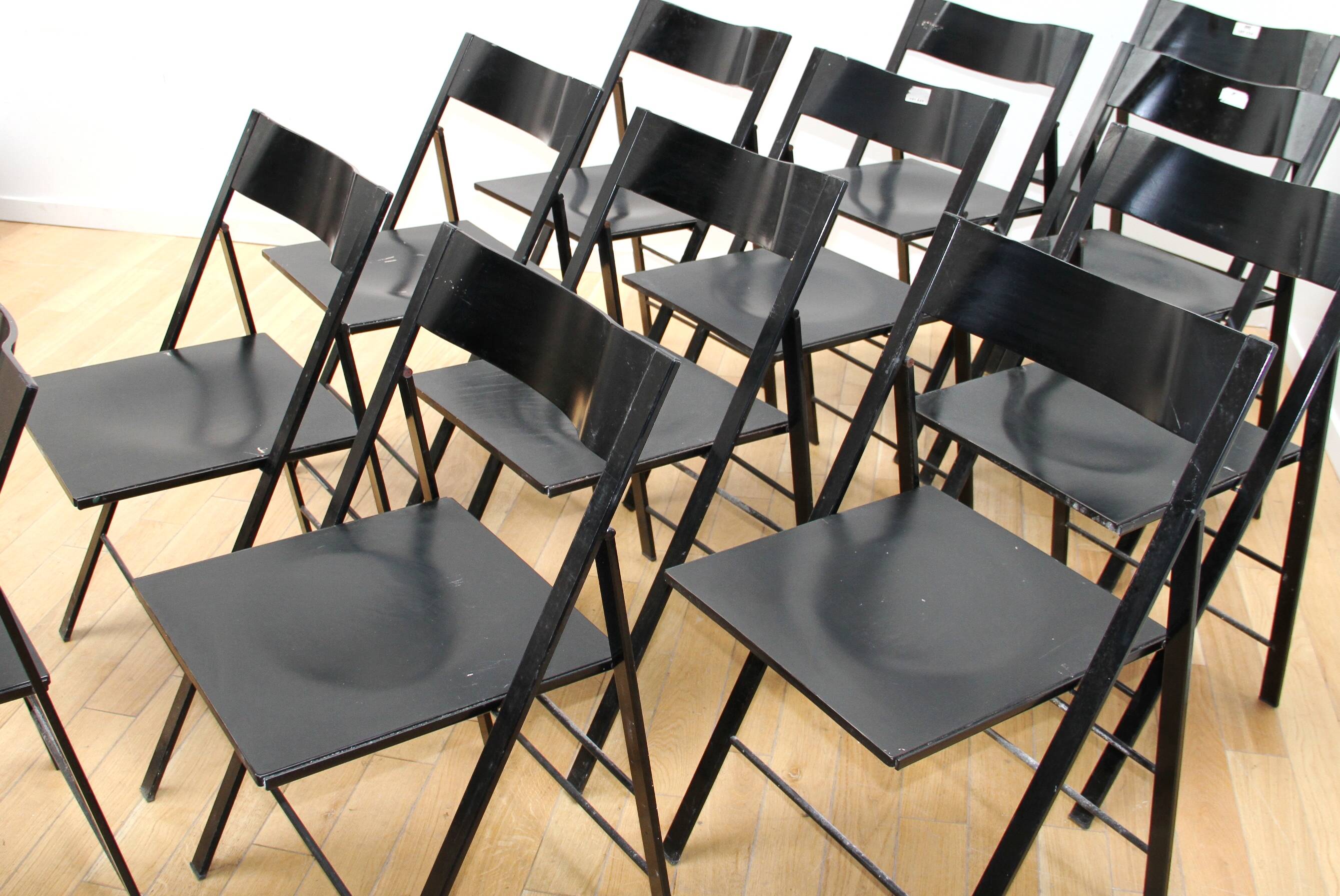 Suite of 12 folding designer chairs