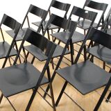 Suite of 12 folding designer chairs