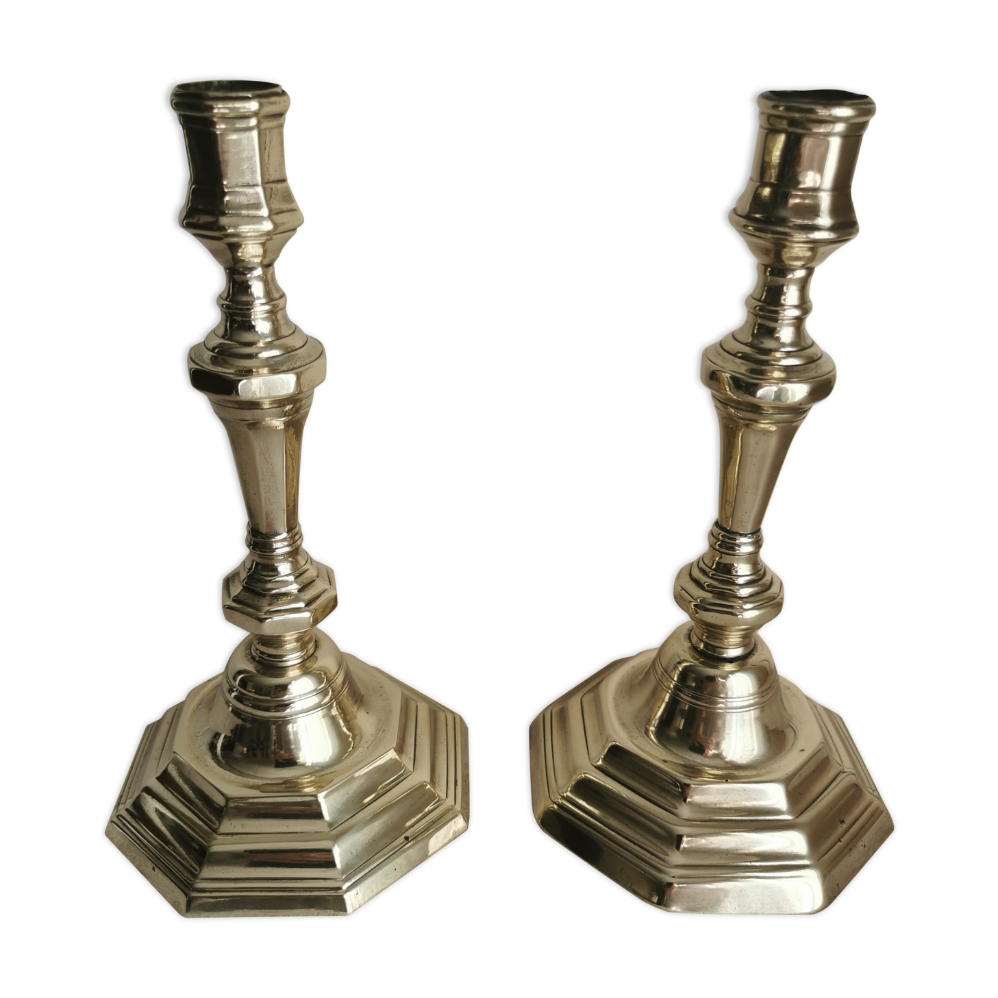 Pair of polished bronze candle holders XVIII th century