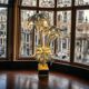 Lampadaire en forme de palmier a 3 branches en métal doré