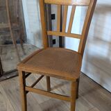 Antique patinated wooden bistro chair from the early 20th century.