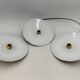 Suspensions in enamelled sheets