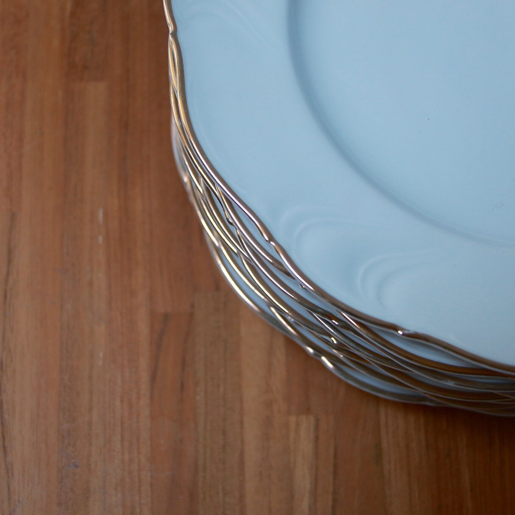 White and gold porcelain plates