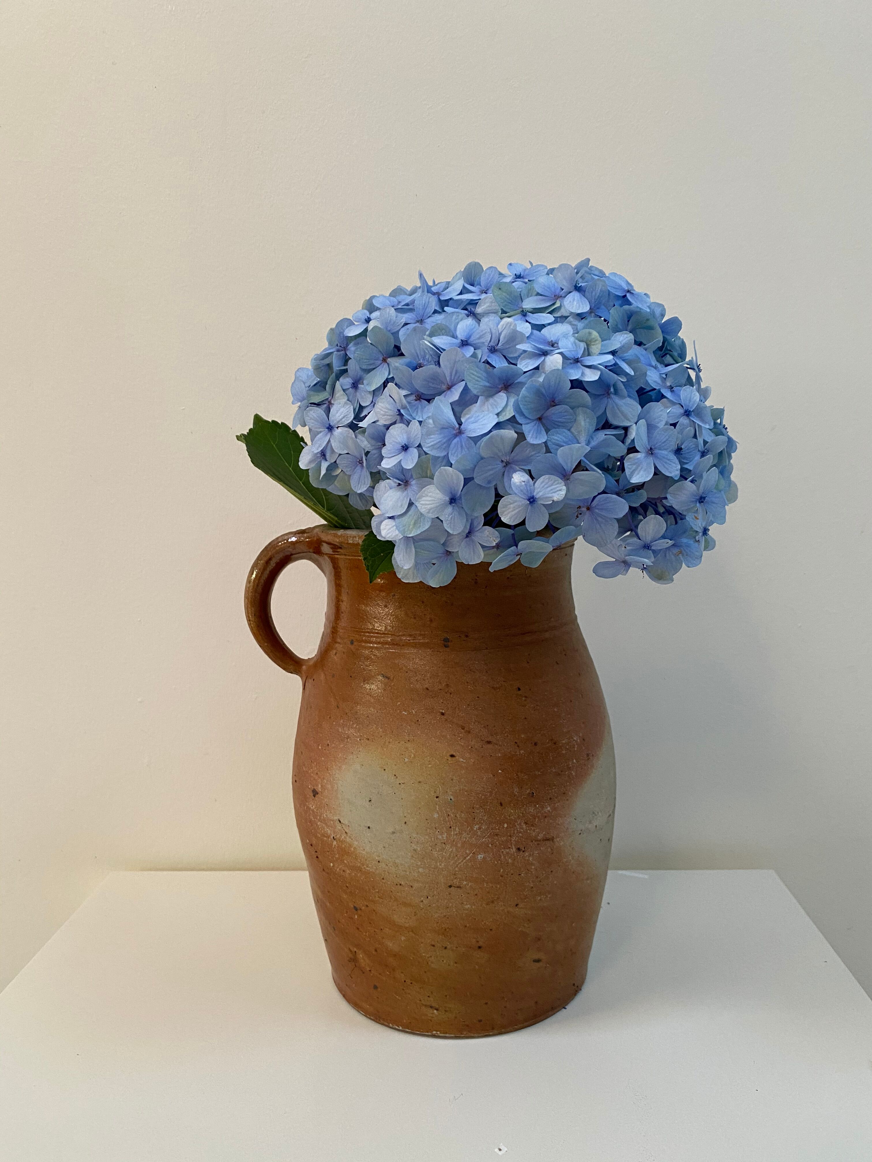 Old sandstone pitcher pot