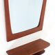 Set consisting of mid-century teak wall mirror and shelf / Danish modern design / 1960s