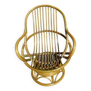 fauteuil en rotin pivotant