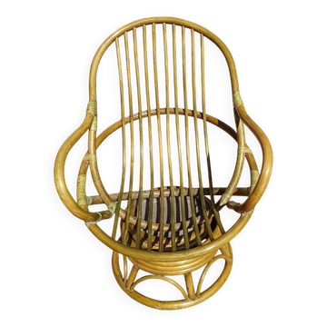 Fauteuil en rotin pivotant vintage 