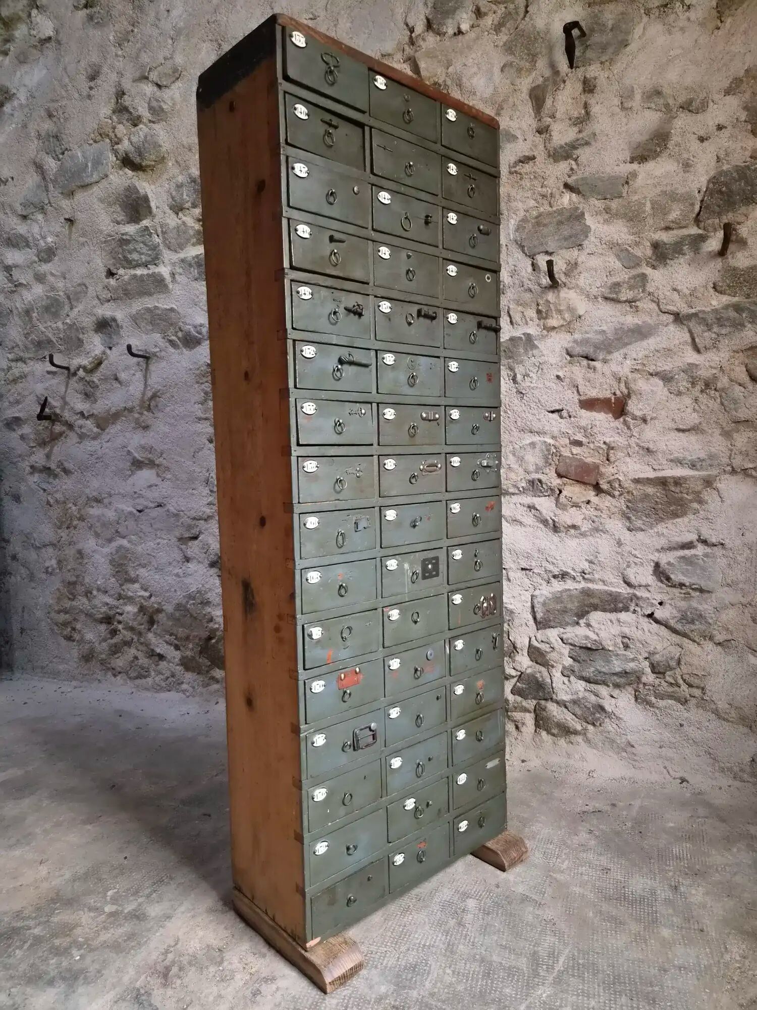 Antique hardware cabinet with 48 drawers, circa 1900.