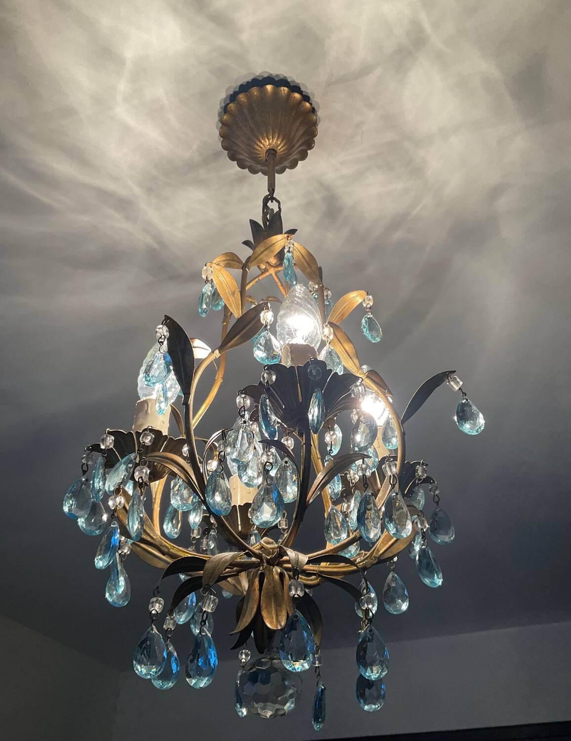 Antique Italian chandelier with cage and blue tassels