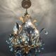 Antique Italian chandelier with cage and blue tassels