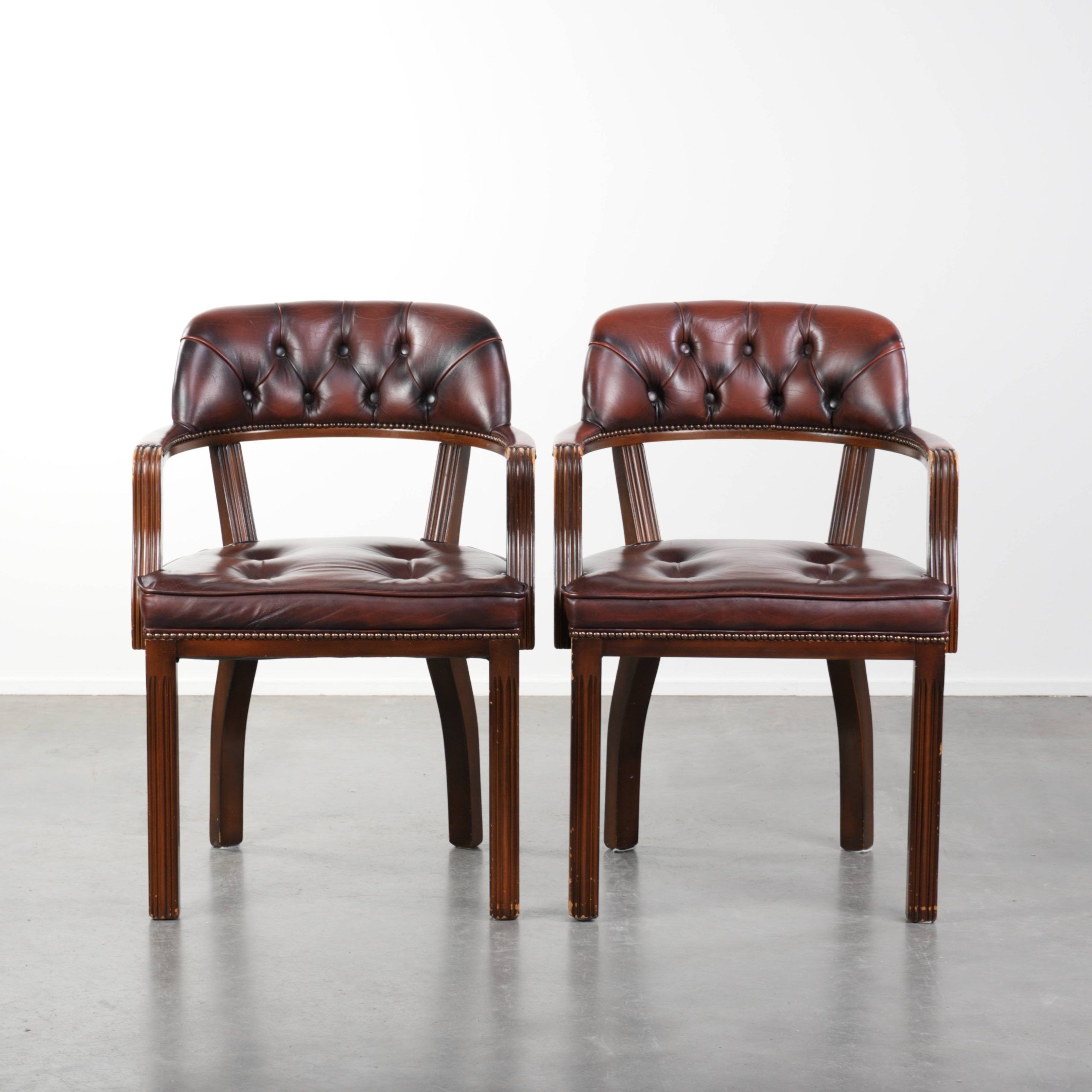 Set of two brown cowhide leather Chesterfield dining chairs